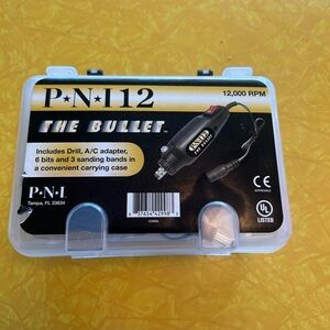PNI12 THE BULLET  Inc’s Drill, AC Adapter 2 sanding bands, 2 Bits